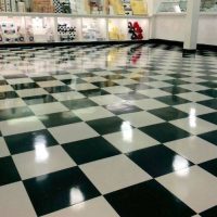 black and white tiled floor in a small shop